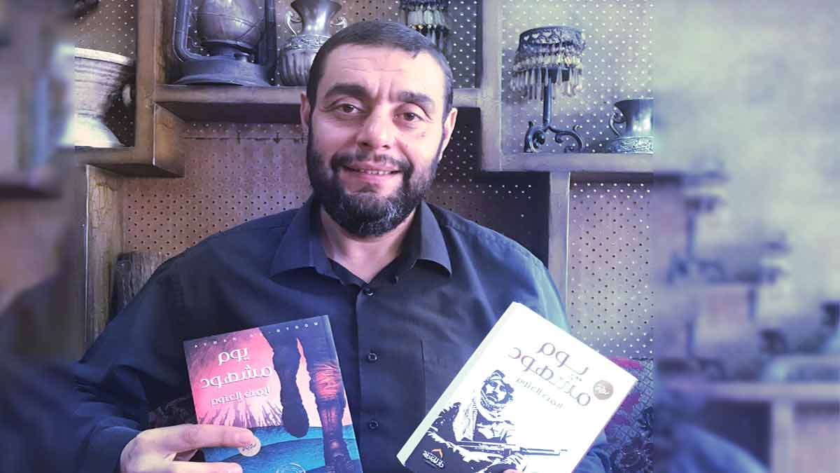 صورة الشاعر أيمن العتوم أثناء توقيع كتابه – اقتباسات أيمن العتوم عن الحياة والحب